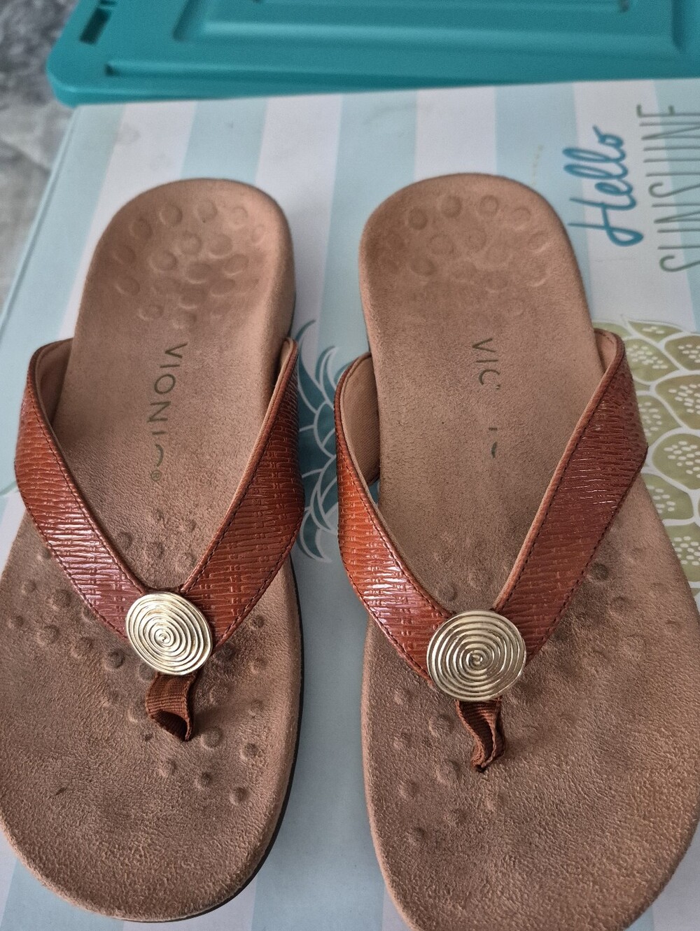 Vionic Brown Toe-Post Sandals with Gold Medallion